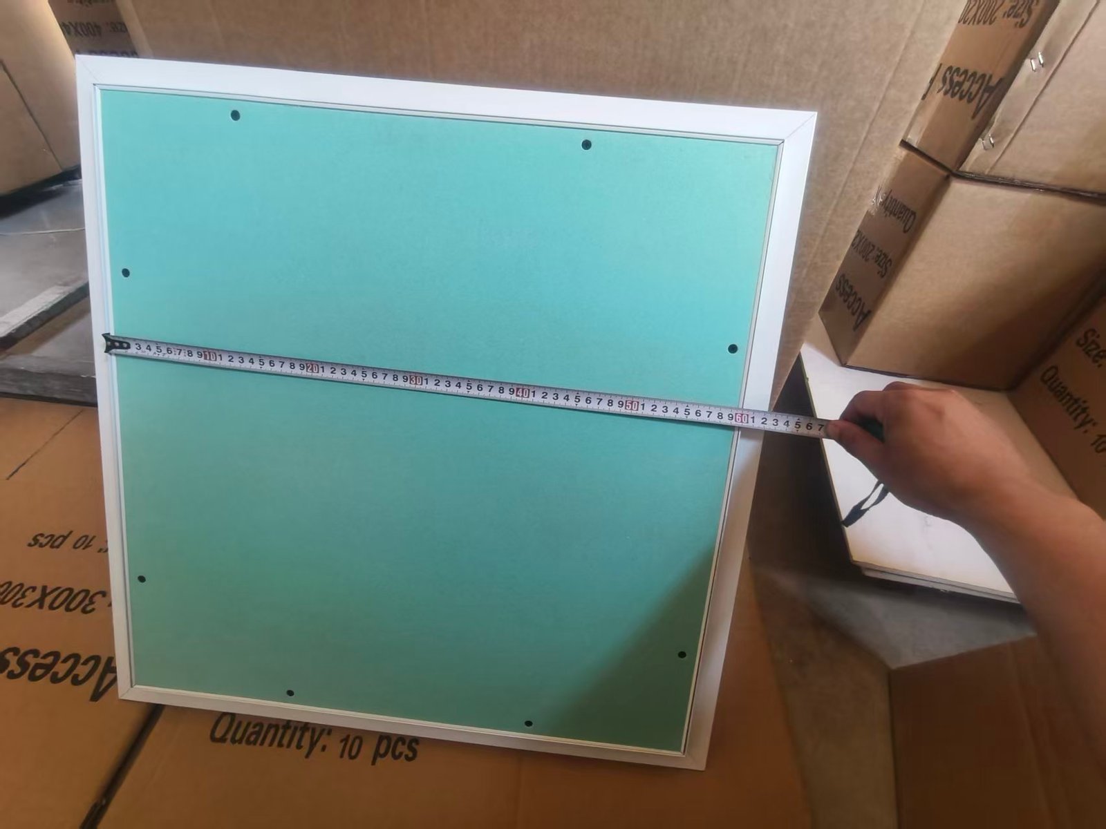 Gypsum ceiling access panel with removable door